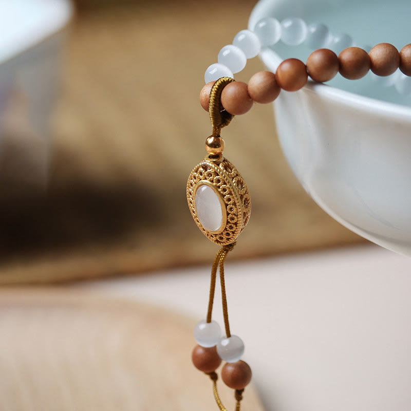 Sandalwood Cat's Eye Three-eyed Dzi Bead Crystal Protectioin Bracelet - Image 9