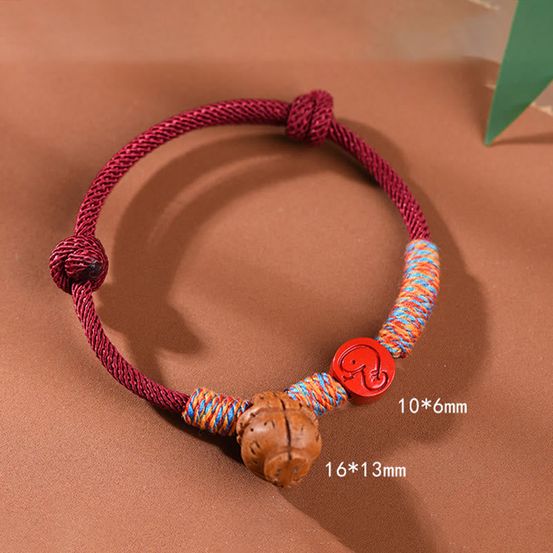 Handmade Chinese Zodiac Red String Peach Pit Cinnabar Luck Bracelet - Image 3