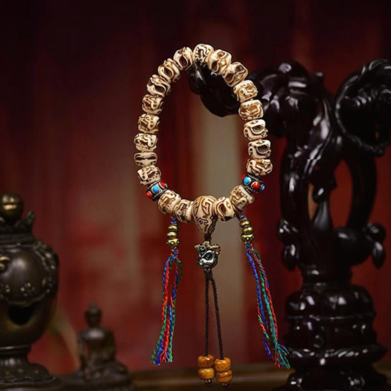 Tibetan Camel Bone Garuda Carved Protection Tassel Bracelet - Image 3