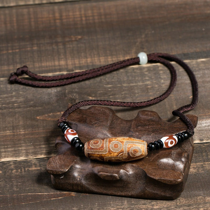 Tibetan Nine-Eye Dzi Bead Protection String Necklace - Image 9