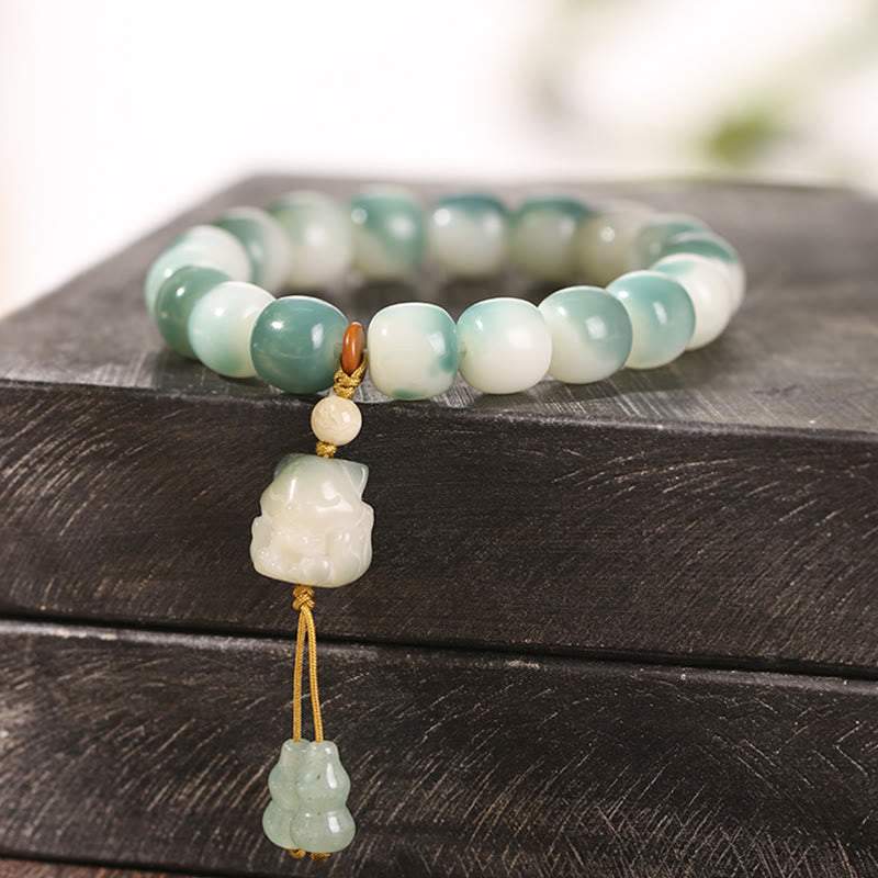 Gradient Bodhi Seed Nine Tailed Fox Cat Paw Claw Pine Cone Peace Bracelet - Image 5