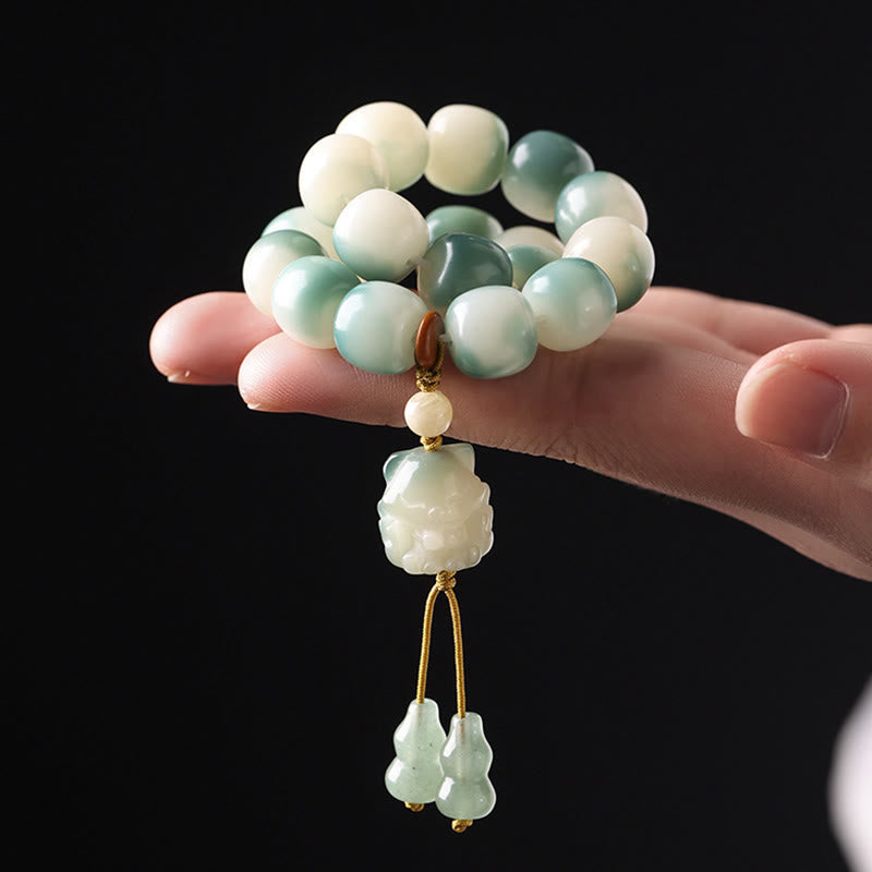 Gradient Bodhi Seed Nine Tailed Fox Cat Paw Claw Pine Cone Peace Bracelet - Image 4