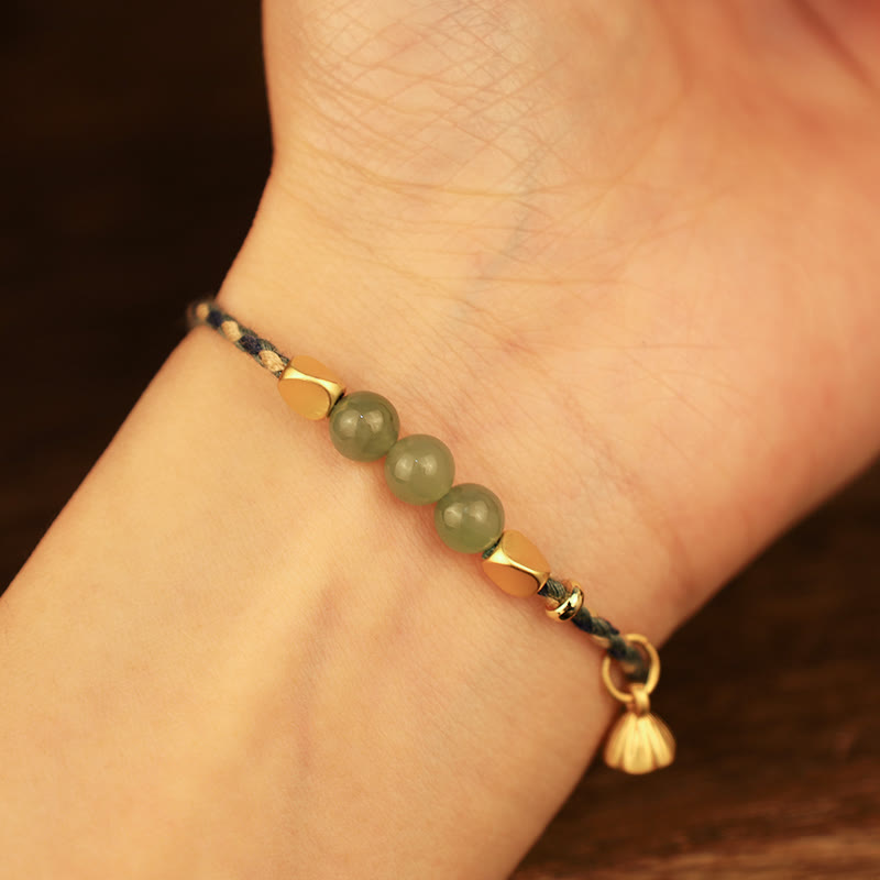 Handcrafted Hetian Jade Lotus Charm Luck Braided Bracelet - Image 9