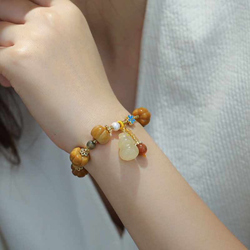 Golden Silk Jade Pixiu Wealth Bracelet - Image 6